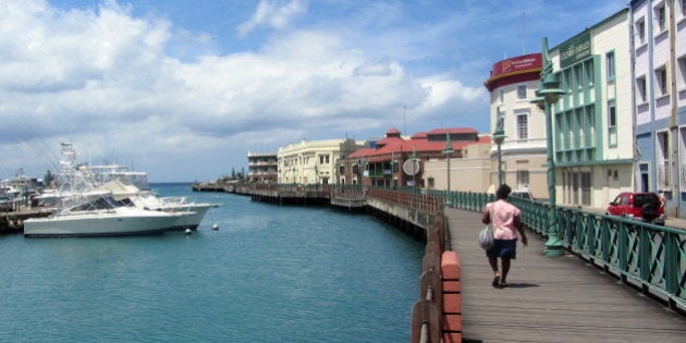 Waterfront walkway in Bridgetown, Barbados.Keen-eyed Canadians may notice the CIBC building in the background; in fact Canadian-owned banks seem to outnumber non-Canadian banks by a wide margin in Barbados. But they still manage to charge you a preposterously high service fee to use your Canadian bank card there.