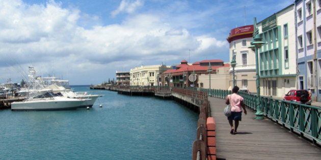 Waterfront walkway in Bridgetown, Barbados.Keen-eyed Canadians may notice the CIBC building in the background; in fact Canadian-owned banks seem to outnumber non-Canadian banks by a wide margin in Barbados. But they still manage to charge you a preposterously high service fee to use your Canadian bank card there.