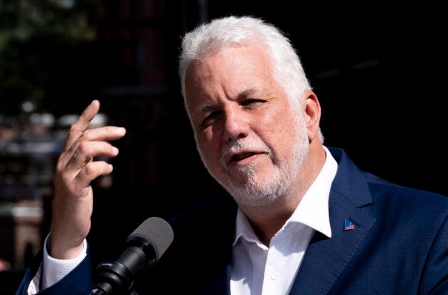 Liberal leader Philippe Couillard respond to questions during a news conference at a seniors residence during a campaign stop in Sherbrooke, Que. on Sept. 5, 2018.