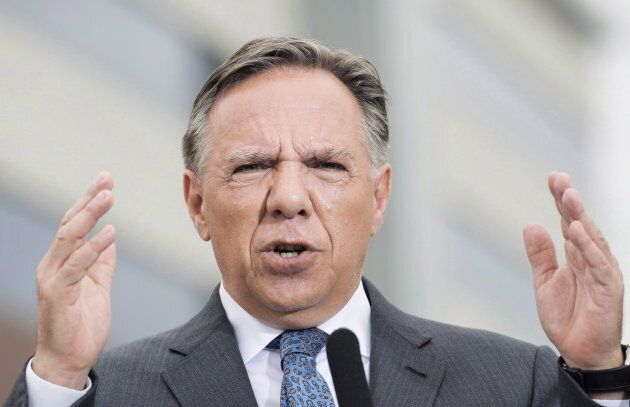 CAQ Leader Francois Legault speaks to reporters during a campaign stop in Vaudreuil-Dorion, Que., Sept. 2, 2018.