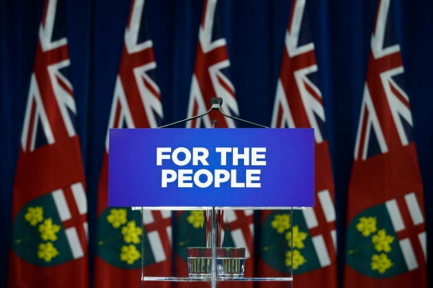 The podium is seen empty as Ontario Premier Doug Ford delays his news conference in Toronto on Sept. 10, 2018.