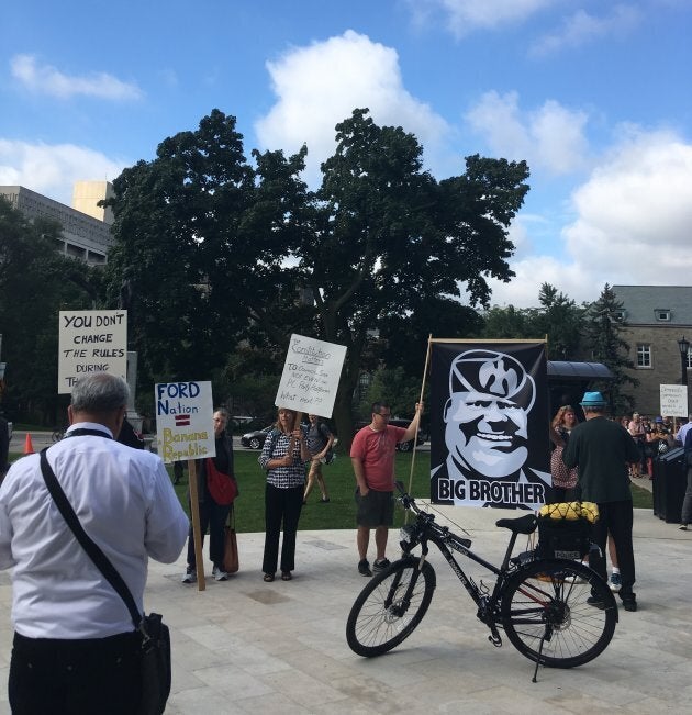 Protesters demonstrate against Ontario Premier Doug Ford outside the legislature in Toronto on Sept. 12, 2018.