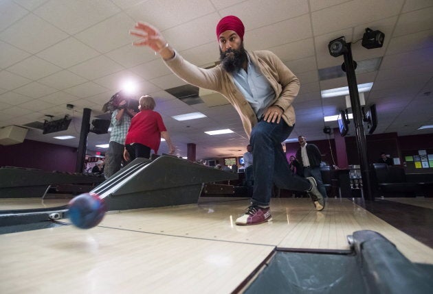 NDP Leader Jagmeet Singh bowls during a social outing with the NDP caucus after the first day of a three-day national strategy session in Surrey, B.C., on Sept. 11, 2018.