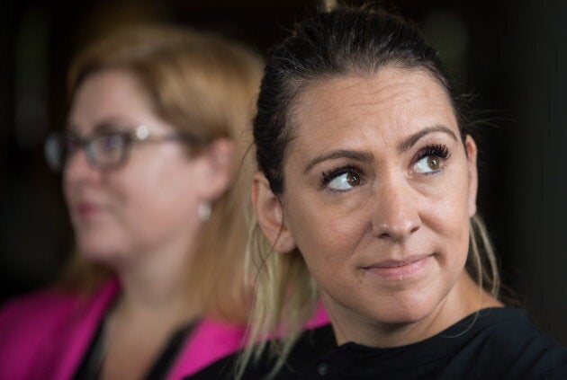 NDP MPs Ruth Ellen Brosseau, front right, and Tracey Ramsey, back, listen during the second day of a three-day NDP caucus national strategy session in Surrey, B.C., on Sept. 12, 2018.