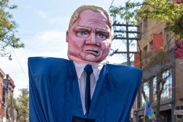 A sign depicting Ontario Premier Doug Ford during the Toronto Labour Day Parade on Sept. 3, 2018.