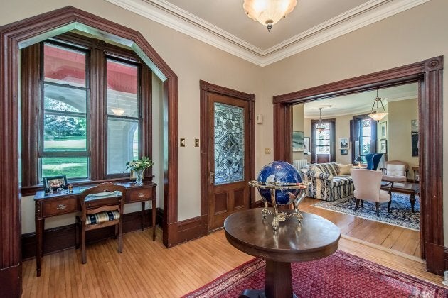 Original hardwood floors remain in many parts of the home.