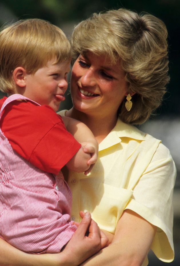 Princess Diana with Prince Harry while on holiday in Majorca, Spain, on August 10, 1987.