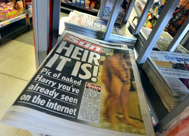 A copy of The Sun featuring a picture of a naked Prince Harry is seen in a shop in London on August 24, 2012.