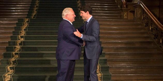 Ontario Premier Doug Ford greets Prime Minister Justin Trudeau at the Ontario legislature in Toronto on July 5, 2018.