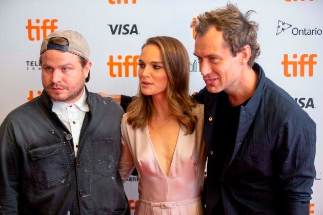 Director Brady Corbet poses with Natalie Portman and Jude Law at the premiere of their film 'Vox Lux' at the Toronto International Film Festival in Toronto, Ontario, September 7, 2018.