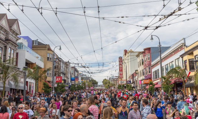 Individuals congregate in the Castro District for the annual Pride celebration on June 27, 2015.