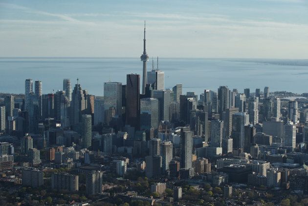 An aerial view of the Toronto city skyline and downtown buildings and Lake Ontario in the background on May 3, 2017.