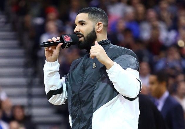 Drake, Toronto Raptors Ambassador, speaks to the crowd on 'Drake Night' during the first half of an NBA game between the Houston Rockets and the Toronto Raptors at the ACC on March 9, 2018.