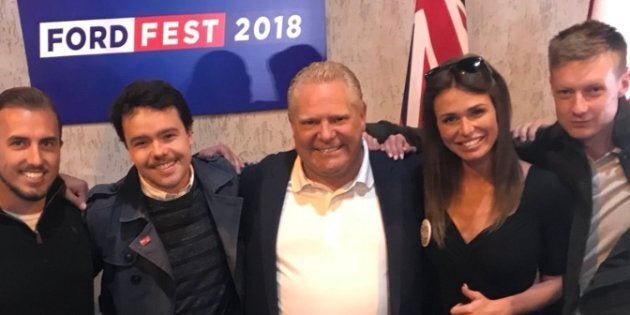 Premier Doug Ford poses for a photo with white nationalist Faith Goldy at Ford Fest on Saturday.