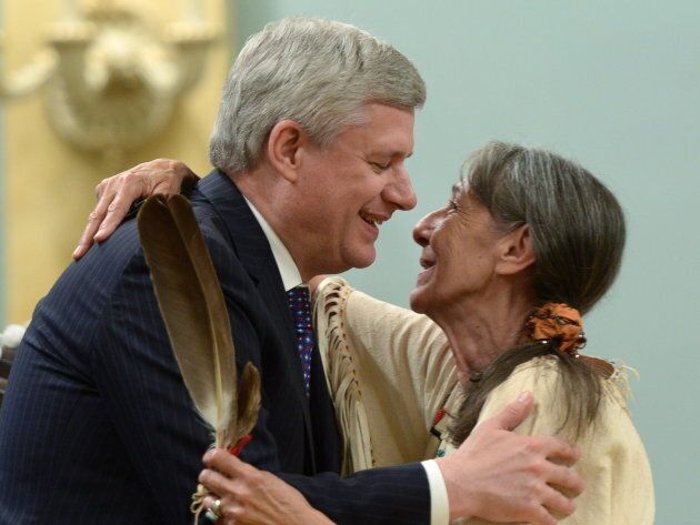 Stephen Harper hugs Elder Evelyn Commanda-Dewache, a residential school survivor, during the closing ceremony of the Indian Residential Schools Truth and Reconciliation Commission in 2015.