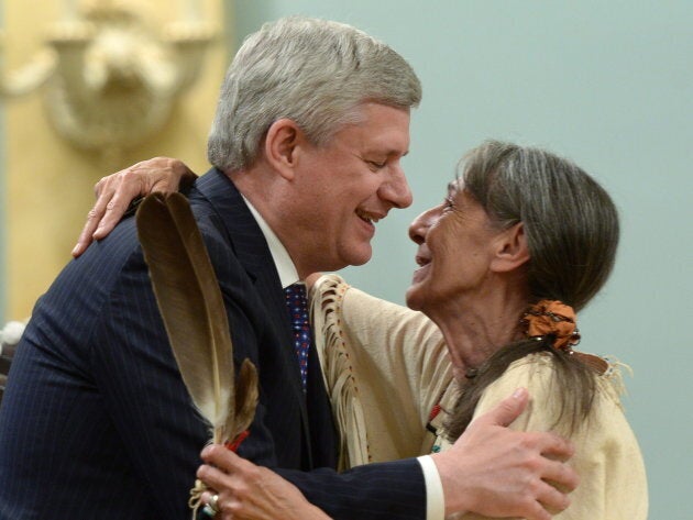 Stephen Harper hugs Elder Evelyn Commanda-Dewache, a residential school survivor, during the closing ceremony of the Indian Residential Schools Truth and Reconciliation Commission in 2015.