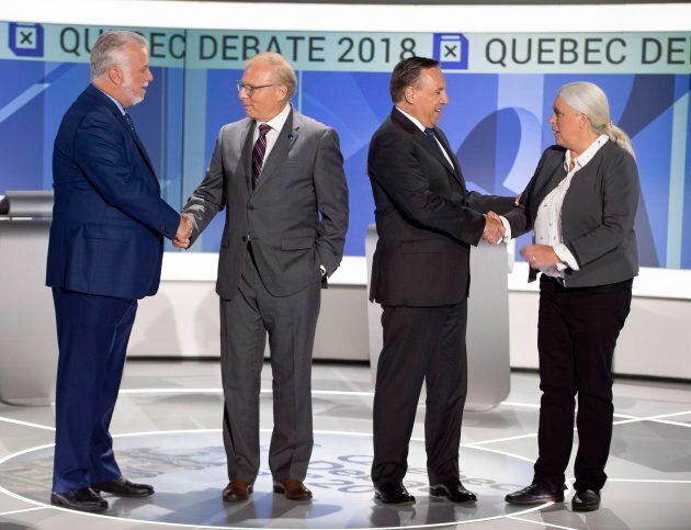 Liberal leader Philippe Couillard, PQ leader Jean-François Lisée, CAQ leader François Legault and Quebec Solidaire leader Manon Massé , right, shake hands before their English debate on Sept. 17, 2018.