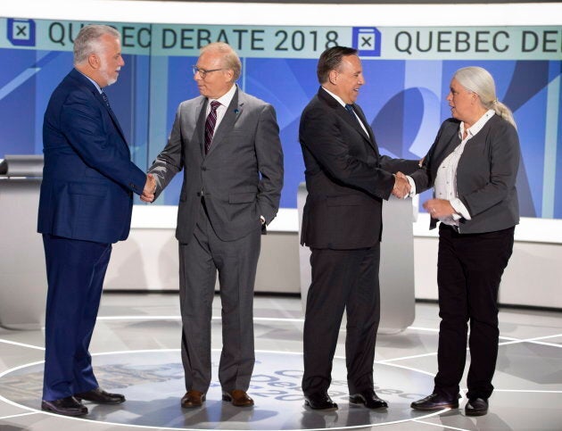 Liberal leader Philippe Couillard, PQ leader Jean-François Lisée, CAQ leader François Legault and Quebec Solidaire leader Manon Massé , right, shake hands before their English debate on Sept. 17, 2018.