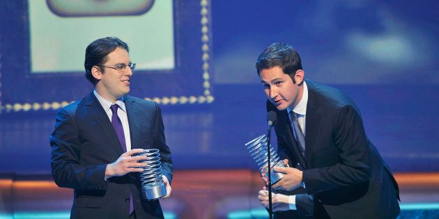 Instagram founders Mike Krieger (L) and Kevin Systrom accept their Webby Breakout Of The Year awards during the 16th annual Webby Awards in New York in this May 21, 2012 file photo.