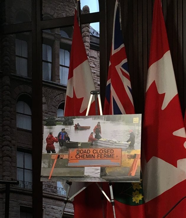 A photo of flooding in Rockland, Ont. is shown during a press conference at Queen's Park in Toronto on Sept. 25, 2018.