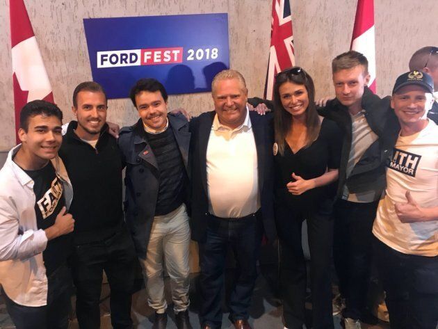 Faith Goldy and her supporters pose with Ontario Premier Doug Ford at Ford Fest on Sep. 22, 2018.