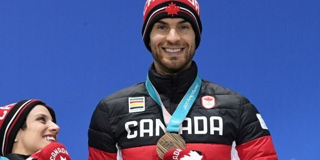 Bronze medallists Meagan Duhamel, left, and Eric Radford pose on the podium at the Pyeongchang 2018 Winter Olympic Games on Feb. 15, 2018.