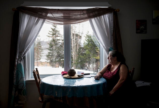 An emotional Charlotte Wolfrey sits in her home on March 23, 2018 after recounting the day her daughter Deidre was killed in a murder-suicide.