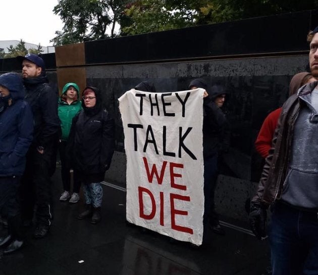 Activists hold a vigil for people lost to overdose in front of Queen's Park on Oct. 1, 2018.