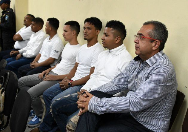 Seven of the accused on the murder of indigenous environmental activist Berta Cáceres sit in court on Sept. 17, 2018 in Tegucigalpa.