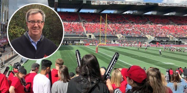 Ottawa Mayor Jim Watson was on the receiving end of a surprise bear hug at this year's Panda Game.