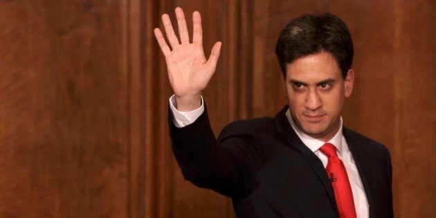 Britain's Labour Party leader Ed Miliband waves as he leaves after delivering his resignation at a press conference in Westminster, London, Friday, May 8, 2015. The Conservative Party surged to a seemingly commanding lead in Britain's parliamentary General Election, with Prime Minister David Cameron remaining in 10 Downing Street.(AP Photo/Tim Ireland)