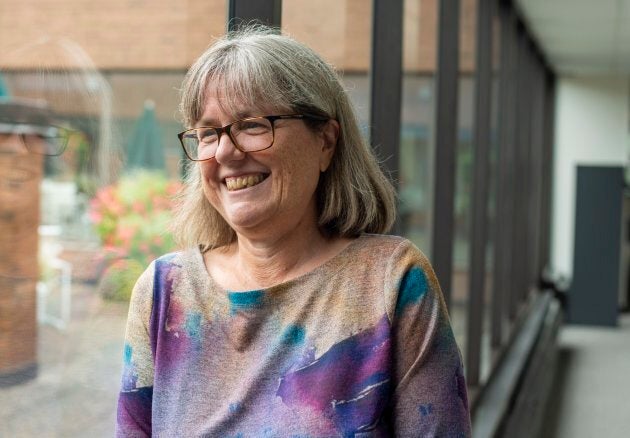 Donna Strickland poses for pictures after being awarded the 2018 Nobel Prize for Physics.