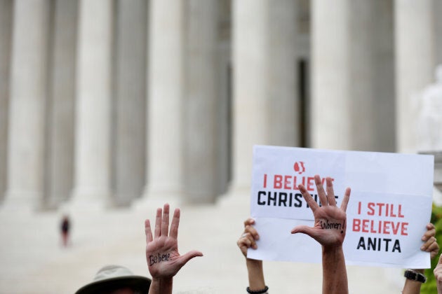 Protesters rally before a hearing where Christine Blasey Ford will testify about an accusation that U.S. Supreme Court nominee Brett Kavanaugh sexually assaulted her in 1982, on Sept. 27, 2018.