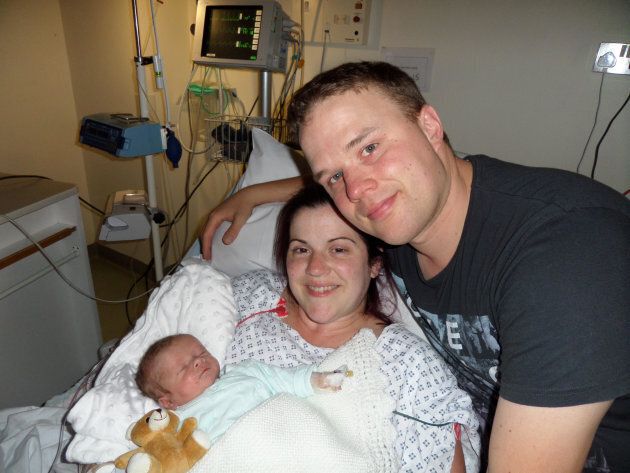 Rob Crussell, with his wife Kate, and son Theo. Theo died shortly after he was born.