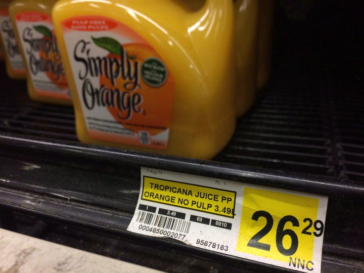 A price tag lists the price of a jug of orange juice at a grocery store in Iqaluit, Nunavut on Dec. 8, 2014.