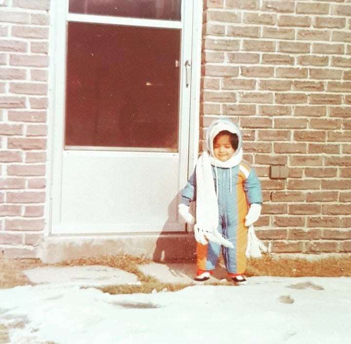 When your parents are immigrants and trying really hard to protect you from the cold, with scarves bigger than you and slip-on sneakers.