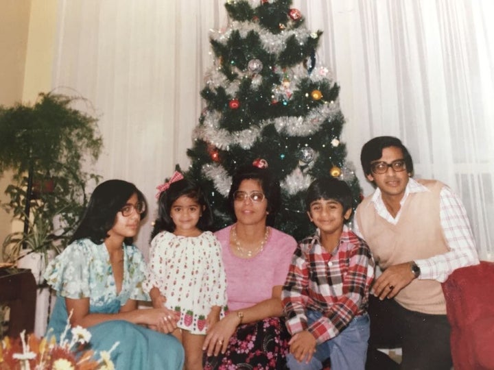 This was our first tree (that my folks still use)! My sister, Jennifer, left, is apparently skeptical about my strawberry Christmas get-up.