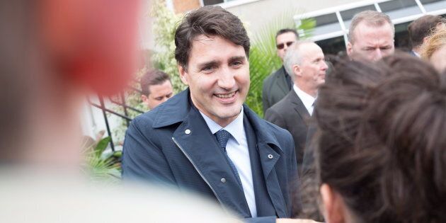 Prime Minister Justin Trudeau greets spectators in Windsor, Ont. on Oct. 5, 2018.