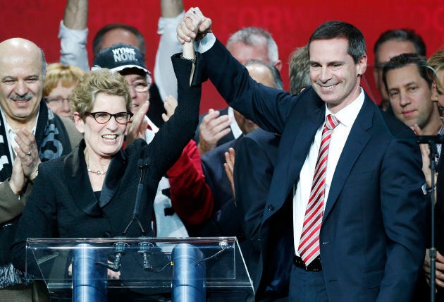 Kathleen Wynne is congratulated by outgoing Dalton McGuinty after winning the leadership bid to become the new premier of Ontario at the Ontario Liberal leadership convention in Toronto Jan. 26, 2013.