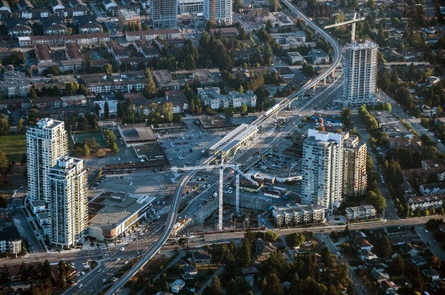 The Vancouver Skytrain line passes through condominiums under construction in Vancouver, British Columbia on Sept. 6, 2018.