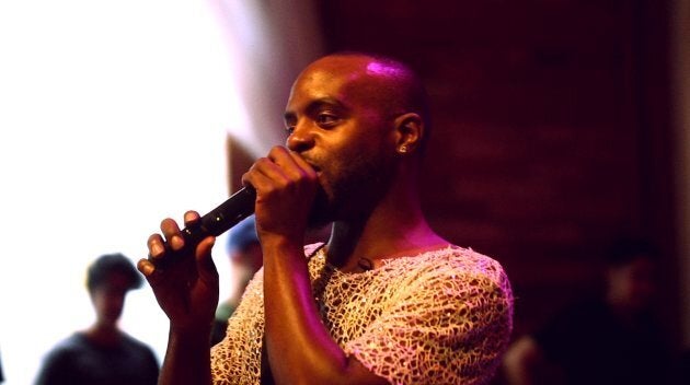 Twysted on the mic at a ballroom event in Toronto.