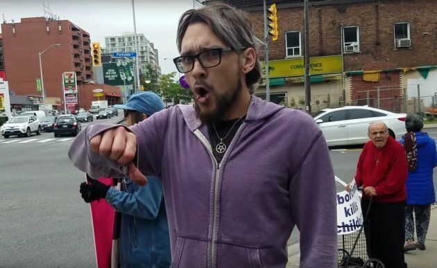 Jordan Hunt, a counter-protester at an anti-abortion rally in downtown Toronto on September 30, moments before roundhouse kicking an organizer.