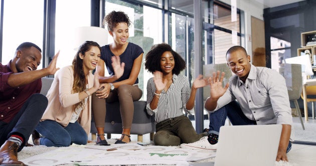 Cropped shot of a group of diverse businesspeople on a video call in an modern office