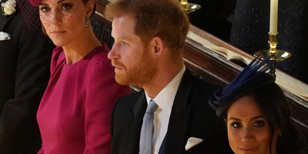 Britain's Catherine, Duchess of Cambridge, Prince Harry, Duke of Sussex, and Meghan, Duchess of Sussex at the wedding ceremony of Britain's Princess Eugenie of York to Jack Brooksbank at St George's Chapel, Windsor Castle, in Windsor, on Friday.
