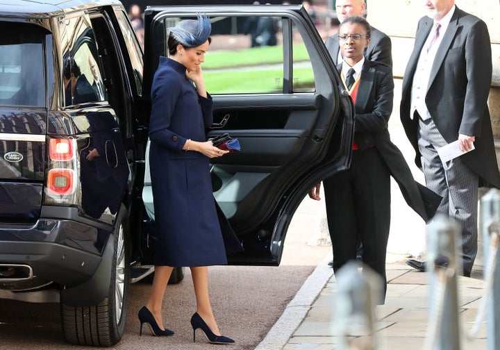 Meghan, Duchess of Sussex attends the wedding of Britain's Princess Eugenie of York to Jack Brooksbank at St George's Chapel, Windsor Castle, in Windsor, on Friday.