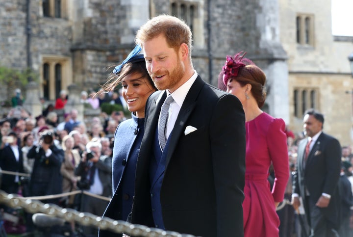 Prince Harry's outfit nicely complemented his wife's.