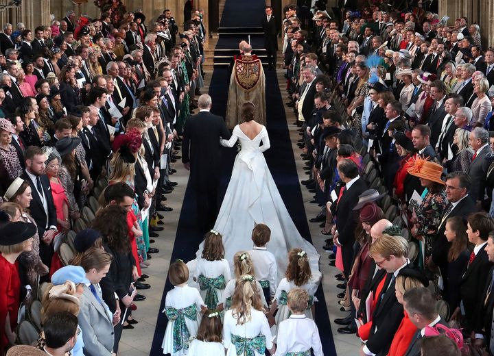 Princess Eugenie walks down the aisle with her father, Prince Andrew. What a photo!
