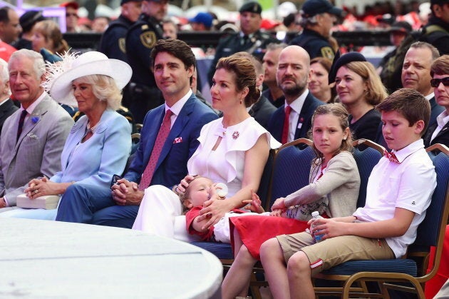 Prince Charles, left to right, Camilla Duchess of Cornwall, Prime Minister Justin Trudeau, Sophie Gregoire Trudeau, Hadrien Trudeau, Ella-Grace Trudeau and Xavier Trudeau take part in Canada 150 celebrations on Parliament Hill in Ottawa on July 1, 2017.