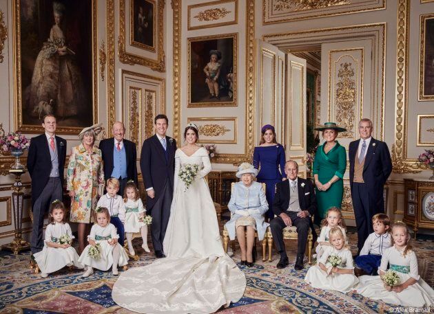 Prince George, Princess Charlotte, Queen Elizabeth, Prince Phillip, Maud Windsor, Louis De Givenchy, Theodora Williams, Mia Tindall, Isla Phillips, Savannah Phillips, Thomas Brooksbank, Nicola Brooksbank, George Brooksbank, Princess Beatrice, Sarah Ferguson, and Prince Andrew are pictured with Princess Eugenie and Jack Brooksbank in an official portrait.