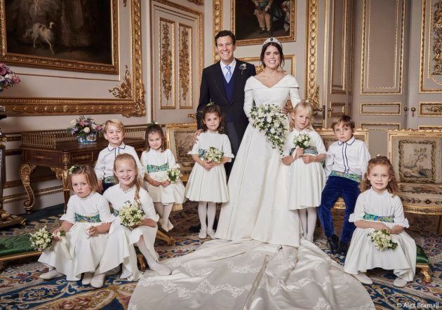 Mia Tindall, Savannah Phillips, Maud Windsor, Prince George, Princess Charlotte, Theodora Williams, Isla Phillips and Louis De Givenchy are pictured with Princess Eugenie and Jack Brooksbank in an official portrait.